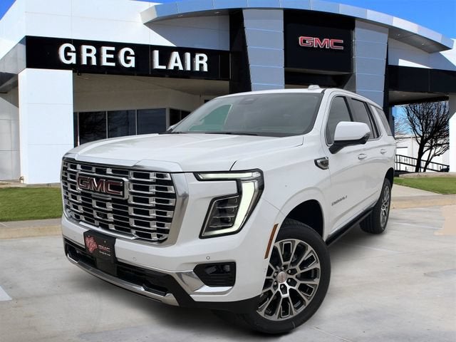 2026 GMC Yukon Denali in Summit White — front three-quarter view