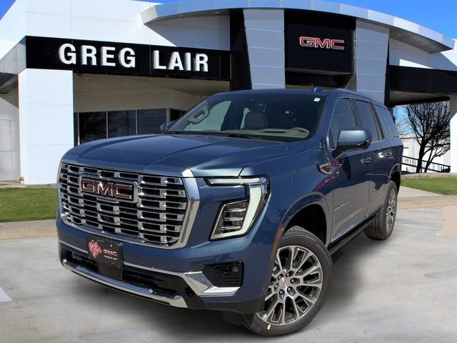 2026 GMC Yukon Denali in Downpour Metallic — front three-quarter view