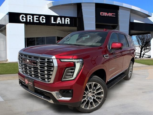 2026 GMC Yukon Denali in Volcanic Red Tintcoat — front three-quarter view