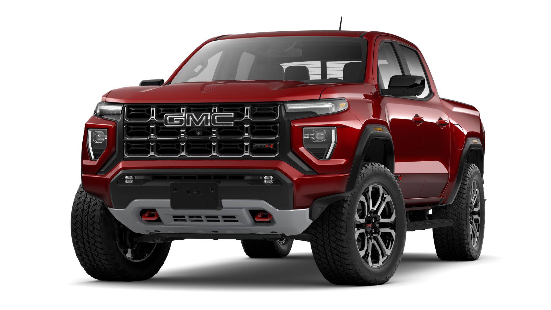 2026 GMC Canyon AT4 in Volcanic Red Tintcoat — front three-quarter view