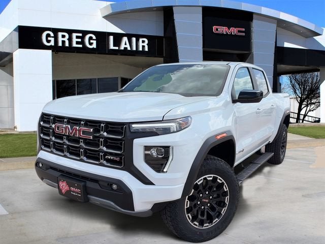 2026 GMC Canyon AT4 in Summit White — front three-quarter view