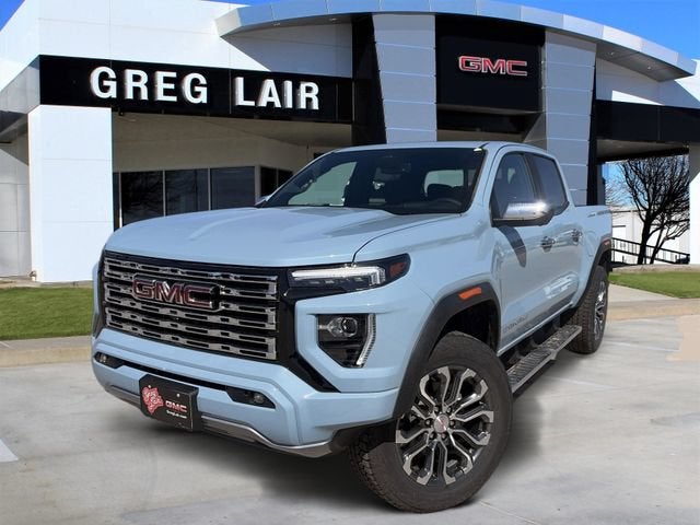 2026 GMC Canyon Denali in Glacier Metallic — front three-quarter view