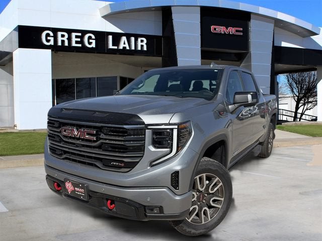 2026 GMC Sierra 1500 AT4 in Sterling Metallic — front three-quarter view