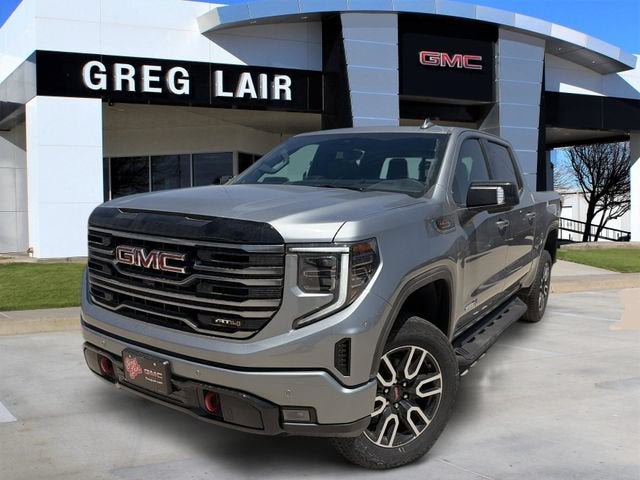 2026 GMC Sierra 1500 AT4 in Sterling Metallic — front three-quarter view