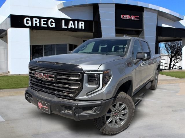 2026 GMC Sierra 1500 AT4X in Sterling Metallic — front three-quarter view