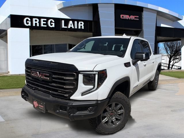 2026 GMC Sierra 1500 AT4X in Summit White — front three-quarter view